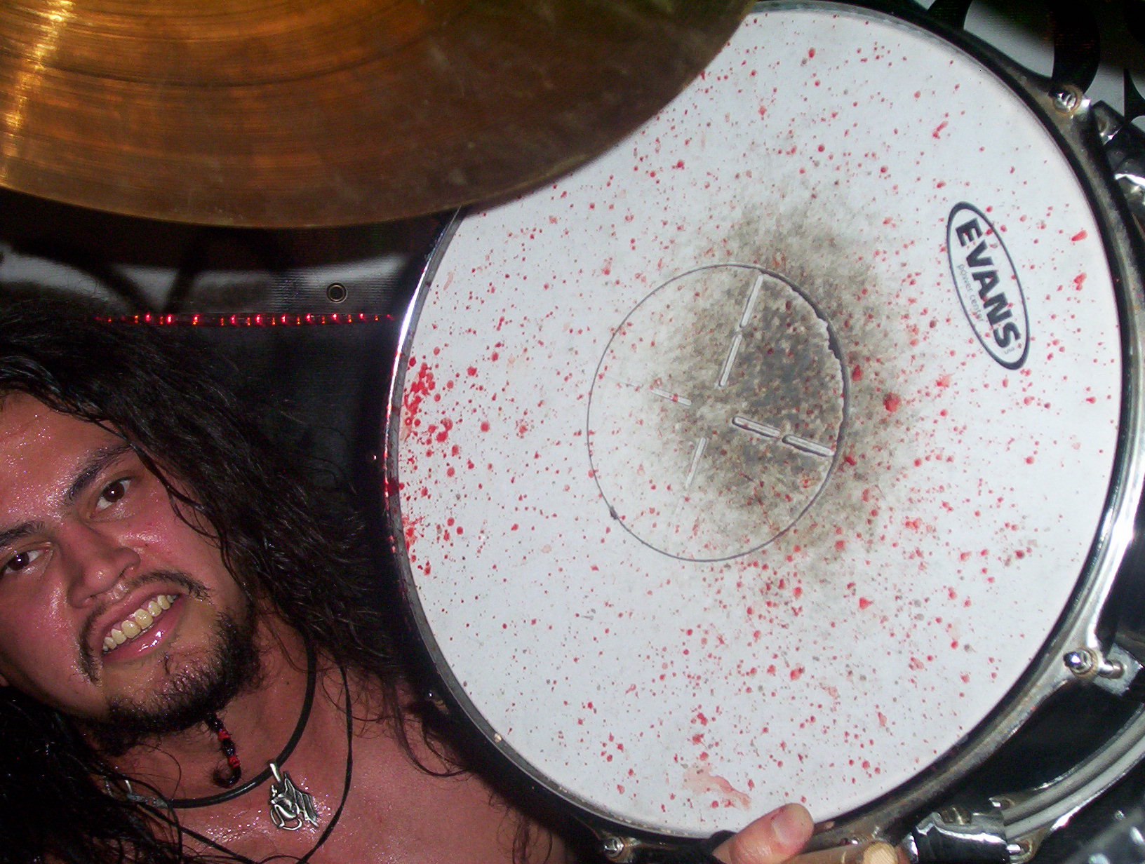 Brian Vorisek of Osiris Rising with bloody drums after the show - Solid Sound Studios Pompano Beach, FL - July 2004 - Photo by Ali Harris